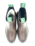Pair of brown leather boots with green labels on a white background